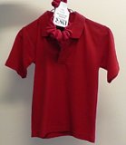 front of red cook cats polo shirt