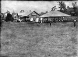 school buildings and grounds in black and white